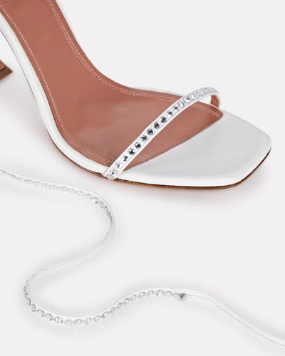 Shop Amina Muaddi Vita Leather Wrap Sandals In White