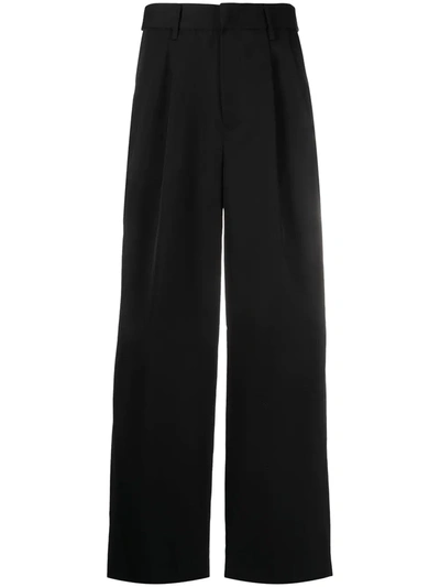 Shop Juunj Pleated Straight-leg Trousers In Black