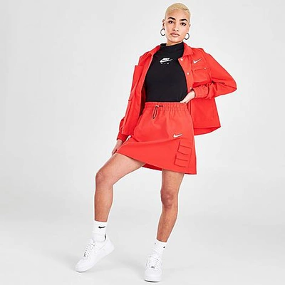 Shop Nike Women's Sportswear Swoosh Utility Skirt In Light Crimson