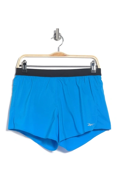Shop Reebok Running 4 Shorts In Horizon Blue