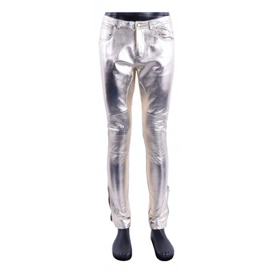 Pre-owned Moschino Leather Trousers In Gold