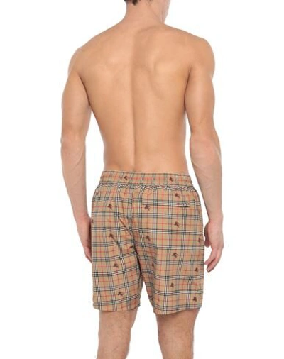 Shop Burberry Swim Shorts In Camel