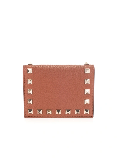 Shop Valentino Small Rockstud Wallet In Selleria Color In Brown