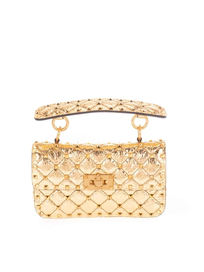 Shop Valentino Small Rockstud Spike Bag In Antique Brass In Gold
