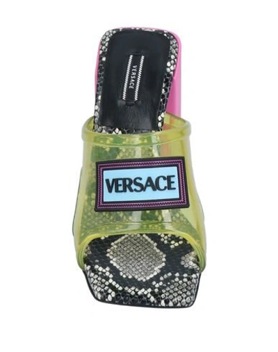 Shop Versace Sandals In Yellow