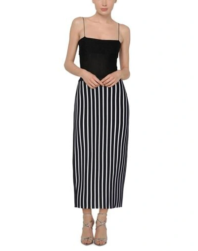 Shop L'edition Midi Skirts In Black
