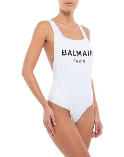 Shop Balmain One-piece Swimsuits In White