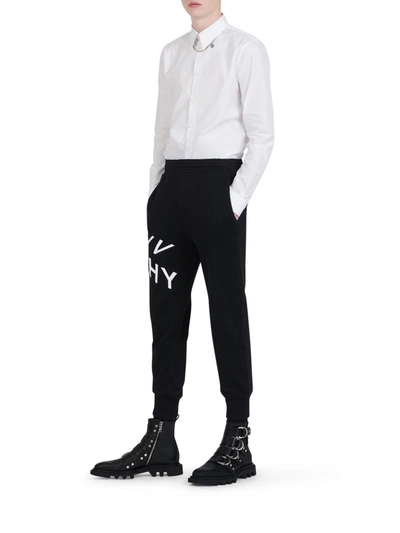 Shop Givenchy Refracted Embroidered Jogger Pants In Black