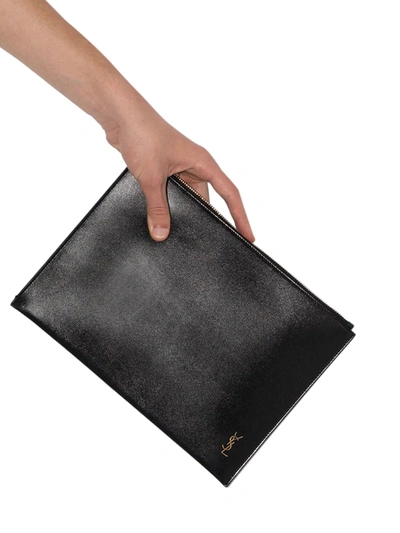 Shop Saint Laurent Monogram Pouch Bag In Black