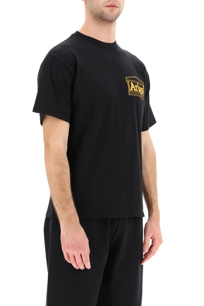 Shop Aries T-shirt With Noodles Logo Print In Black,orange