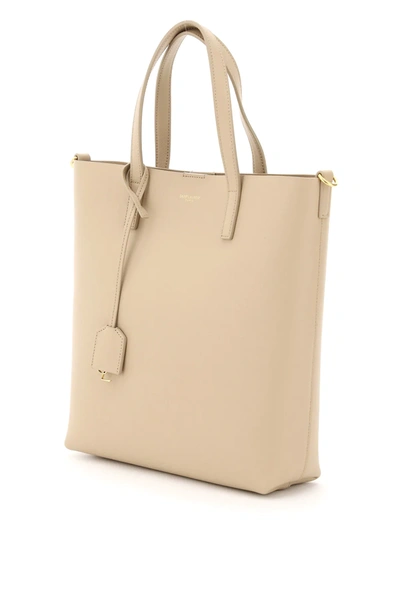 Shop Saint Laurent North/south Toy Leather Shopping Bag In Beige