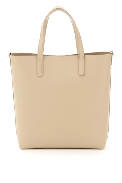 Shop Saint Laurent North/south Toy Leather Shopping Bag In Beige