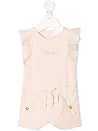 Shop Chloé Embroidered-logo Ruffled Jumpsuit In Pink