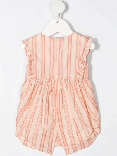 Shop Chloé Striped Sleeveless Jumpsuit In Pink