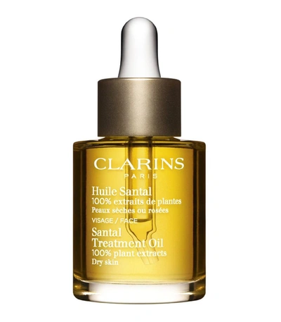 Shop Clarins Santal Treatment Oil In Yellow