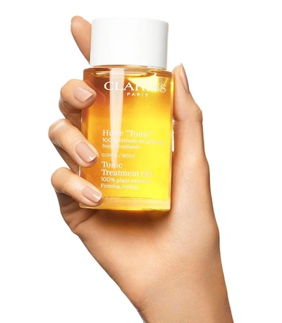 Shop Clarins Tonic Body Treatment Oil In Yellow