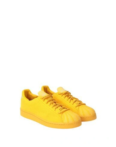 Shop Adidas Originals By Pharrell Williams Sneakers In Yellow