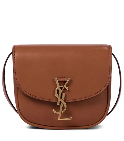 Shop Saint Laurent Kaia Small Leather Crossbody Bag In Brown