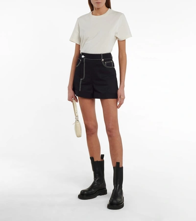 Shop Monse Stretch Cotton-blend Asymmetric Shorts In Black