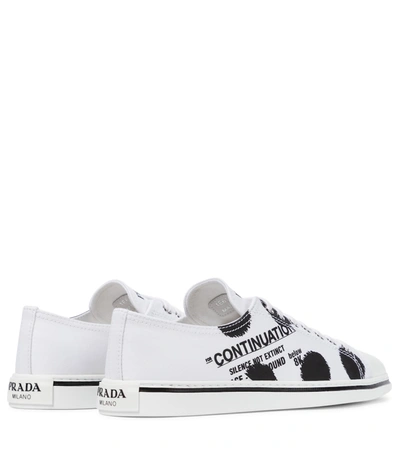 Shop Prada Printed Canvas Sneakers In White