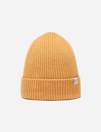 Shop Bhode 'hawick' Scottish Knitted Beanie Hat (lambswool) In Yellow