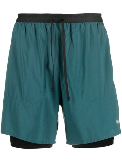 Shop Nike Swoosh Logo-print Two-tone Track Shorts In Blue