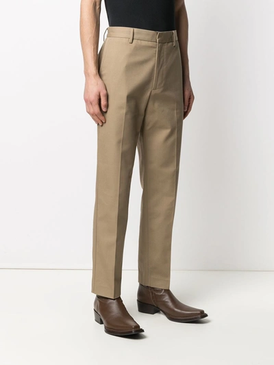 Shop Acne Studios High Waist Trousers In Beige