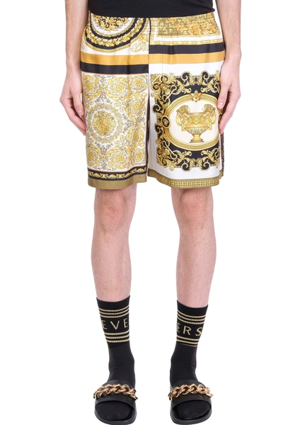 Shop Versace Shorts In Gold Silk