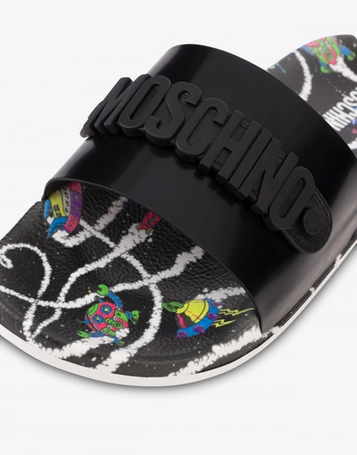 Shop Moschino Pool Slides Spaceships In Black