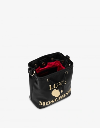 Shop Love Moschino Padded Heart Bucket Bag In Black