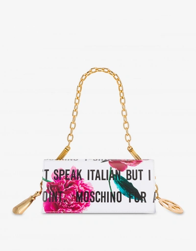 Shop Moschino Slogan & Flowers Shoulder Bag With Charm In White