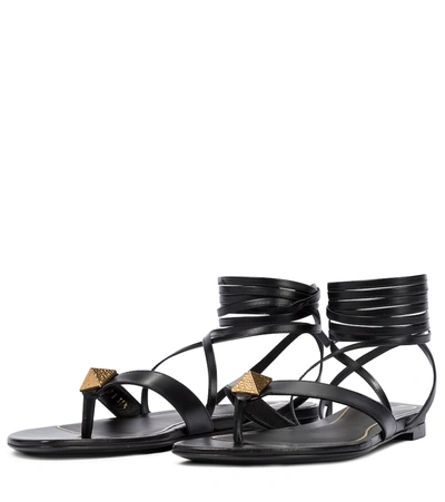 Shop Valentino Roman Stud Leather Thong Sandals In Black