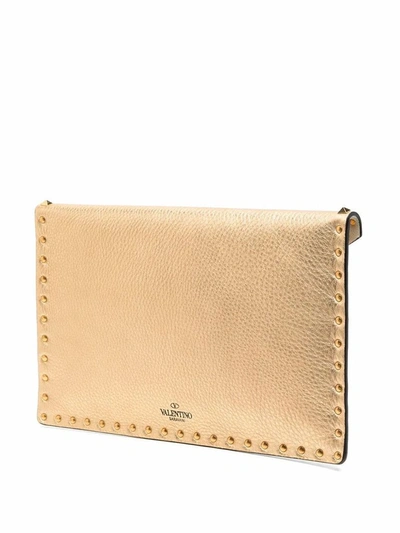 Shop Valentino Garavani Women's Gold Leather Pouch