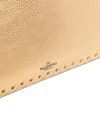 Shop Valentino Garavani Women's Gold Leather Pouch