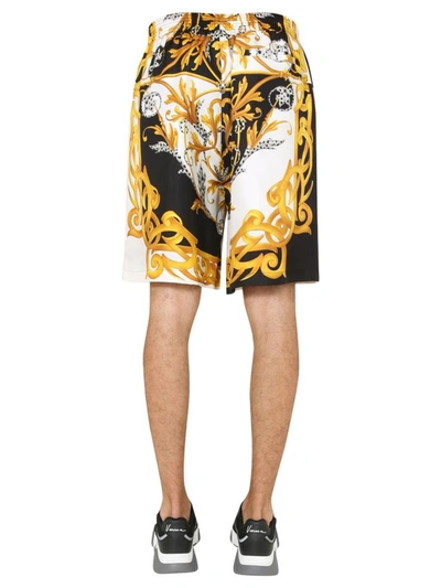 Shop Versace Printed Shorts In White