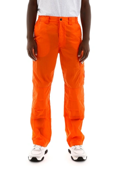 Shop Msgm Nylon Cargo Trousers In Arancio