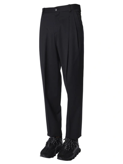 Shop Versace High-waist Trousers In Black