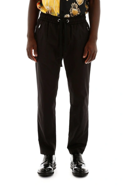 Shop Dolce & Gabbana Joggers With Side Bands In Nero