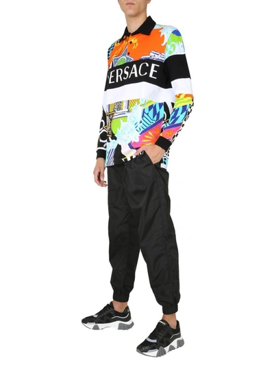 Shop Versace Long Sleeved Polo Shirt In Multicolour