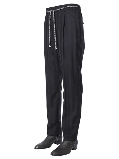 Shop Saint Laurent Striped Jogger Pants In Black