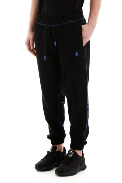 Shop Marcelo Burlon County Of Milan Marcelo Burlon Tiger Trackpants In Black Blue