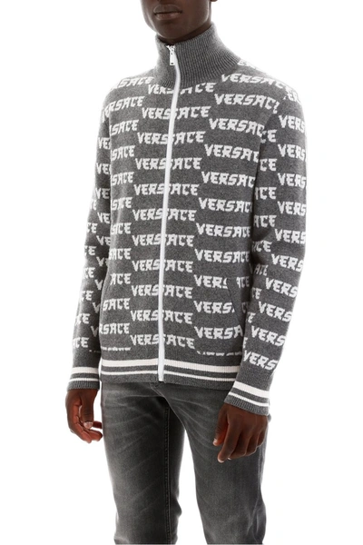 Shop Versace Monogram Zipped Cardigan In Grigio Melange Bianco