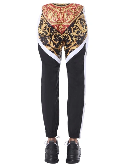 Shop Versace Jogging Pants In Red