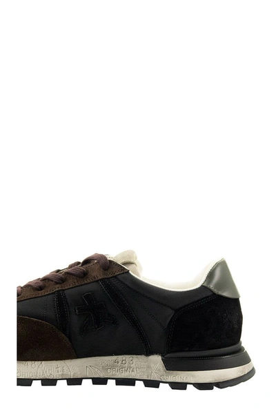 Shop Premiata Sneakers Johnlow_5066 In Blue/brown