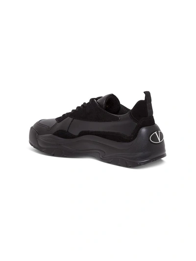 Shop Valentino Gumboy Leather Sneakers In Black