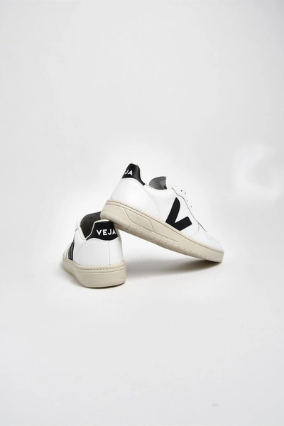 Shop Veja Sneakers V-10 Tall.nero Bianch In White