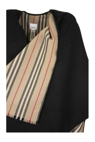 Shop Burberry Icon Stripe Detail Wool Cape In Black