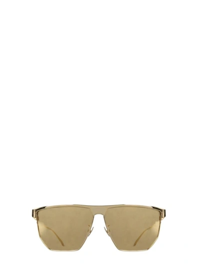 Shop Bottega Veneta Sunglasses In Gold