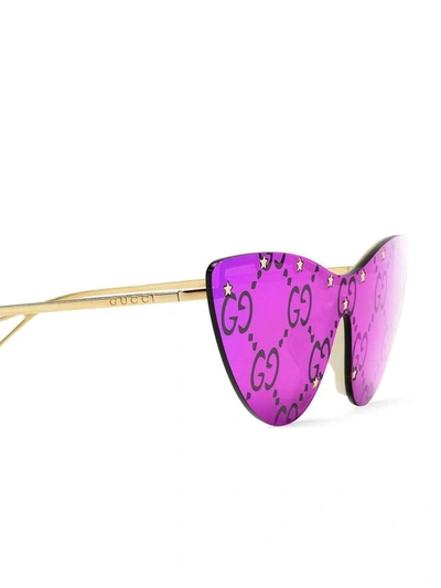 Shop Gucci Sunglasses Golden
