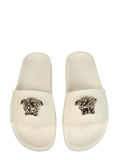 Shop Versace Slide Sandals In White